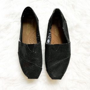 Women’s Black Classic Glitter TOMS Slip-Ons Sz 6.5